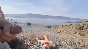 A Daring Man Exposes Himself To A Nudist Milf Who Eagerly Gives Him Oral Pleasure On The Beach